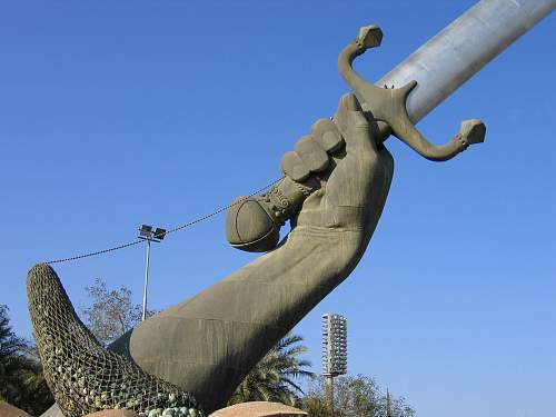 Pile of Helmets &amp; MIG jet seen in Iraq