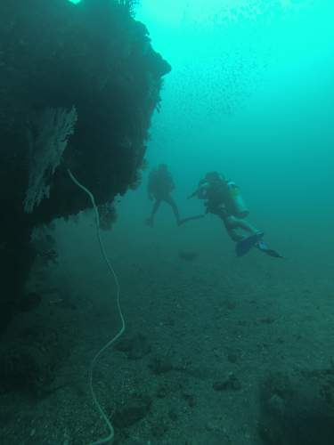 Japanese Patrol boat wreck and naval gun mounted caves on Gilli T , Indonesia