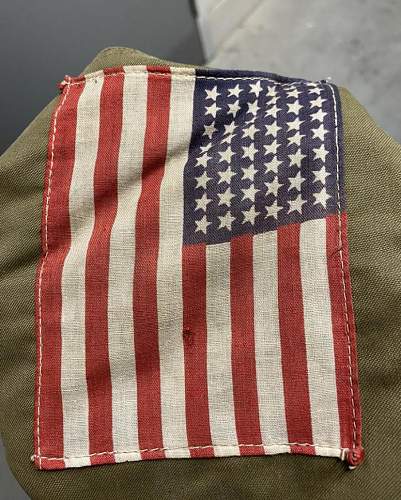 82nd airborne m43 jacket with invasion flag authentic ?