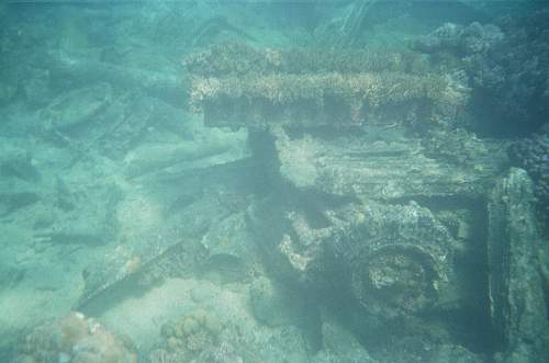 WWII relics dive. Tanks, Jeeps, Trucks.