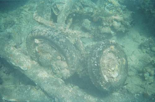 WWII relics dive. Tanks, Jeeps, Trucks.