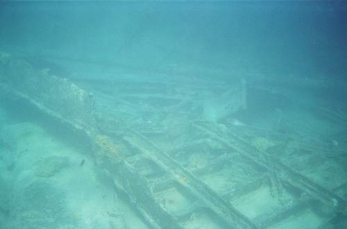 WWII relics dive. Tanks, Jeeps, Trucks.