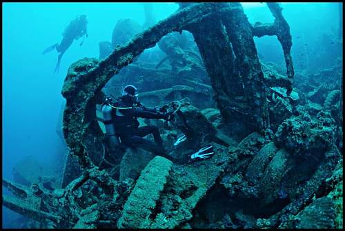 WWII relics dive. Tanks, Jeeps, Trucks.