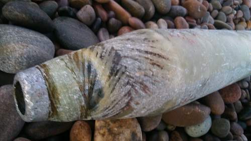 Strange projectile washed up on beach, what is it?