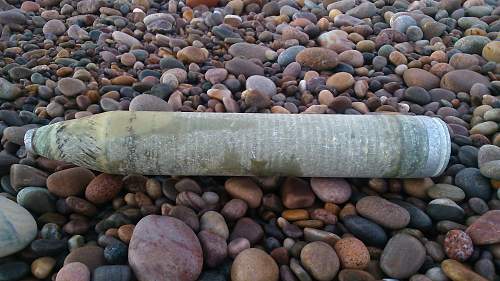 Strange projectile washed up on beach, what is it?