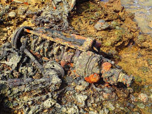 WWII relics dive. Tanks, Jeeps, Trucks.