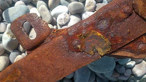 sizeable rusty metal piece washed up...