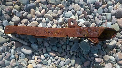 sizeable rusty metal piece washed up...