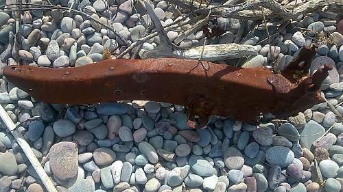 sizeable rusty metal piece washed up...