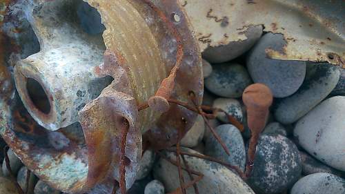 sizeable rusty metal piece washed up...