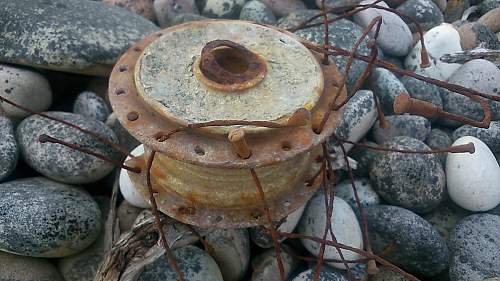 sizeable rusty metal piece washed up...