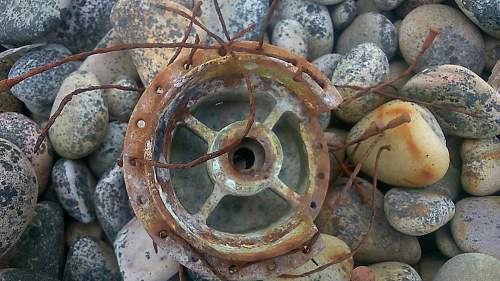 sizeable rusty metal piece washed up...