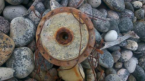 sizeable rusty metal piece washed up...