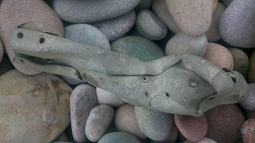 sizeable rusty metal piece washed up...