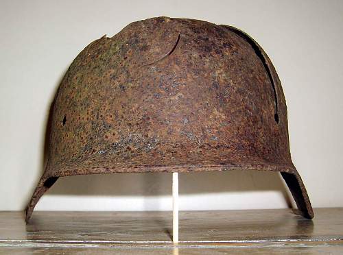 German Helmet in English hedge.