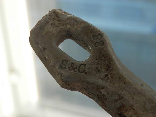 German porcelain fragments  and makers marks on other items  from conflict archaeology excavation in Finland