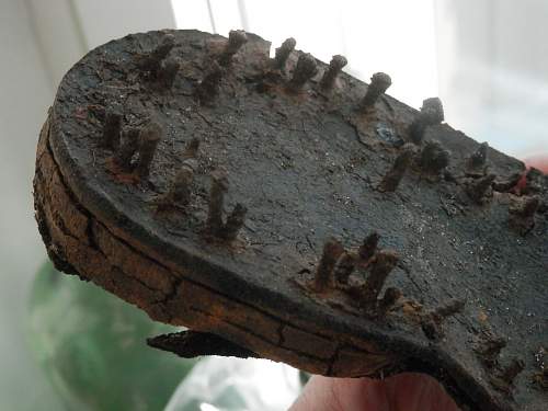 German porcelain fragments  and makers marks on other items  from conflict archaeology excavation in Finland