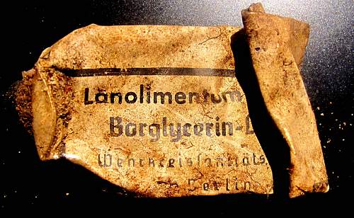 German porcelain fragments  and makers marks on other items  from conflict archaeology excavation in Finland