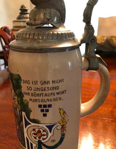 Two German steins for review. Prussian Helmet and Totenkopf