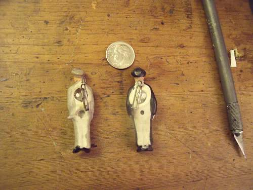 Two porcelain soldier pins