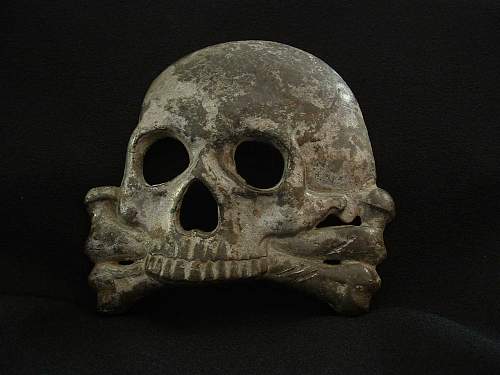 Large skull. Condor Legion emblem? Condor Legion campaign 1936 skull? Any ideas?