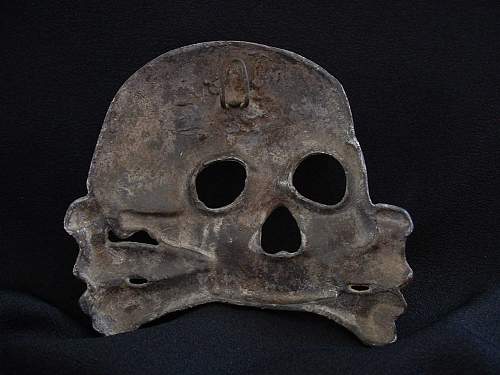 Large skull. Condor Legion emblem? Condor Legion campaign 1936 skull? Any ideas?