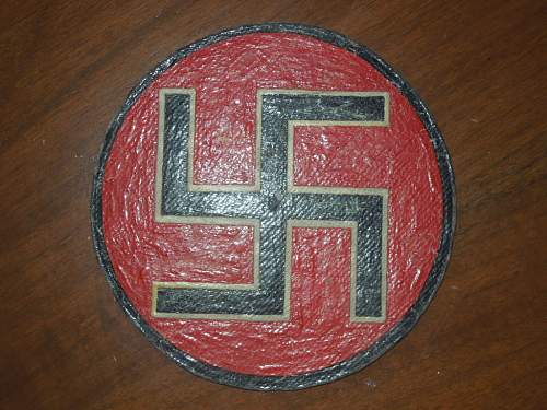 Plaque with swastikas (fiberglass?)