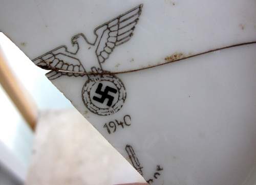 German porcelain fragments  and makers marks on other items  from conflict archaeology excavation in Finland