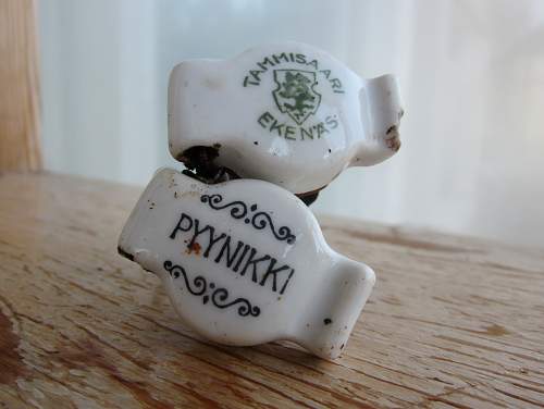 German porcelain fragments  and makers marks on other items  from conflict archaeology excavation in Finland