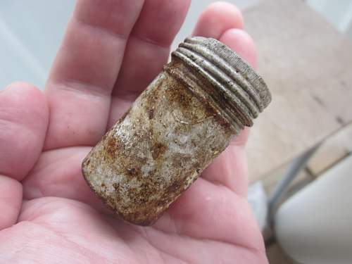 German porcelain fragments  and makers marks on other items  from conflict archaeology excavation in Finland