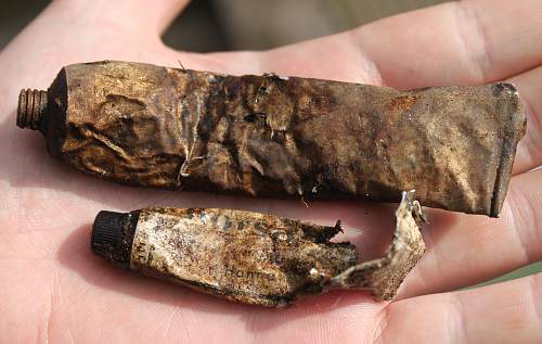 German porcelain fragments  and makers marks on other items  from conflict archaeology excavation in Finland