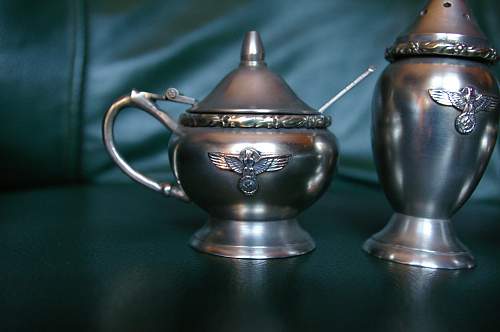 Silver salt and pepper pots...guessing fake? ;-)