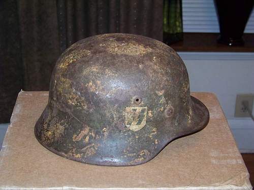 Normandy SS camo helmet found