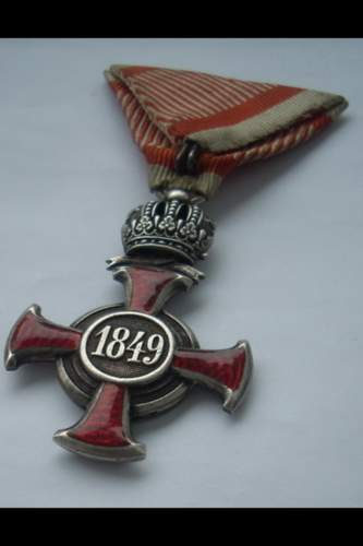 Austro Hungarian Franz Joseph Silver Merit Cross with Crown on War Ribbon with Swords.