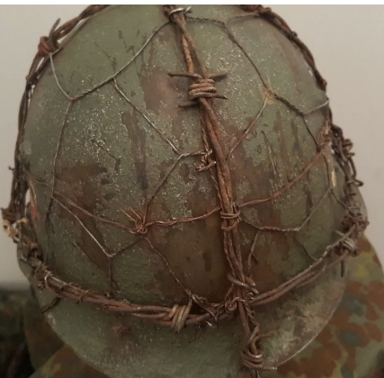 Bulgarian M36C helmet with extensive combat modifications?