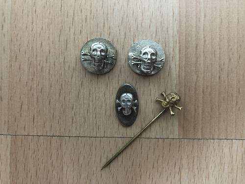 Skull badge. Help needed to identify.