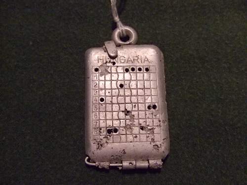 A few axis erkennungsmarken, dog tags.