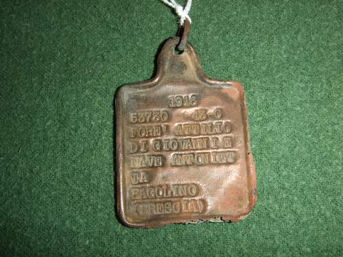 A few axis erkennungsmarken, dog tags.