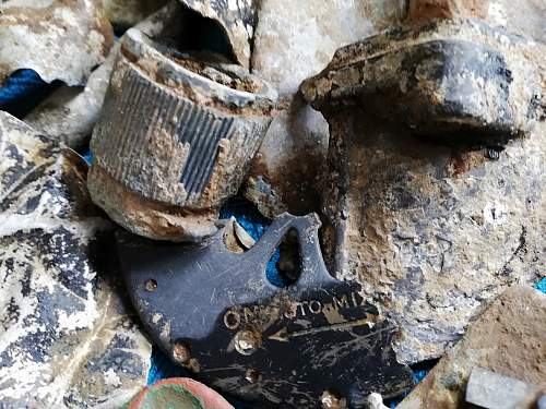 WW2 Aircraft crash relics for help is please.