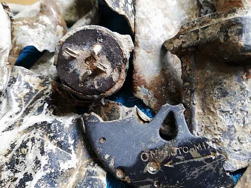 WW2 Aircraft crash relics for help is please.