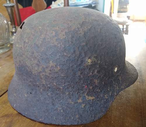 M35 battle damaged helmet