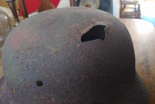 M35 battle damaged helmet