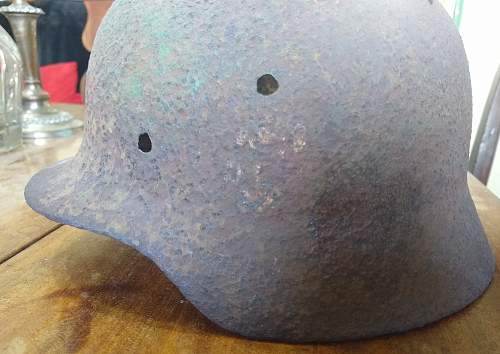 M35 battle damaged helmet