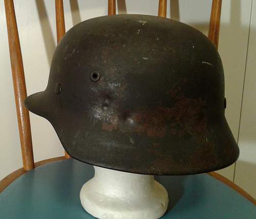 M35 battle damaged helmet