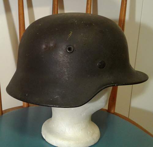 M35 battle damaged helmet