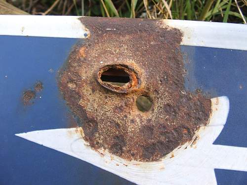 Battle damaged Road sign route to a Knights Cross.