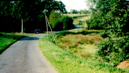 Battle damaged Road sign route to a Knights Cross.