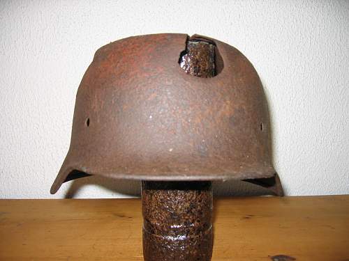 Battle damaged German lids