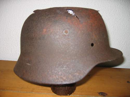 Battle damaged German lids
