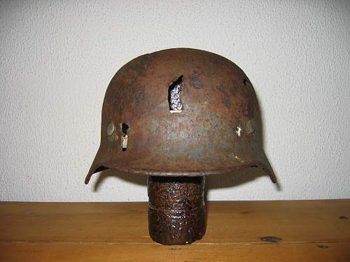 Battle damaged German lids